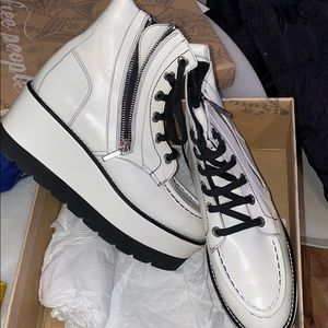 Free People white platform boots.